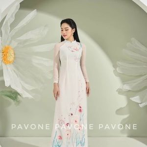 White Vietnamese traditional dresses with embroidery design